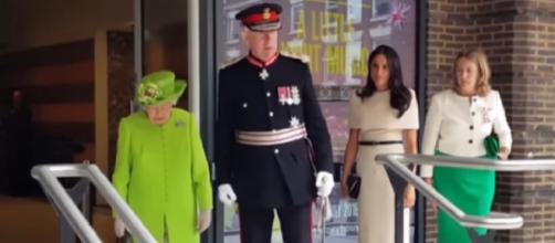 Meghan Markle at her first solo outing with Queen Elizabeth. [Image source/TIME YouTube video]