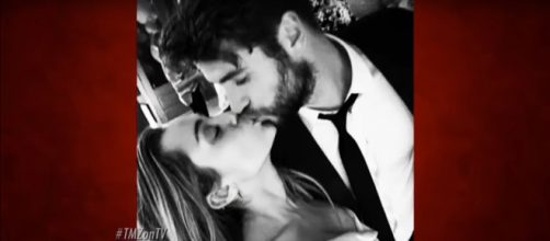 Miley Cyrus, Liam Hemsworth carry before-Christmas wedded bliss into New Year with extended family. [Image source:TMZ-YouTube]