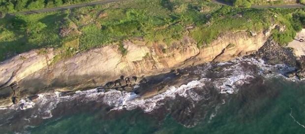 Casal morre arrastado por onda no fim da Praia da Macumba - Foto/Reprodução/TVGlobo Casal morre arrastado por onda no fim da Praia da Macumba - Foto/Reprodução/TVGlobo