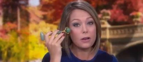 Dylan Dreyer gets her guy co-hosts in on demonstrating the jade roller with her, on 'Today." [Image source: TODAY-YouTube]