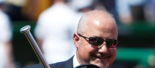 Current Nationals GM Mike RIzzo with a Silver Slugger award. [Image Source: MissChatter/Wikimedia Commons]