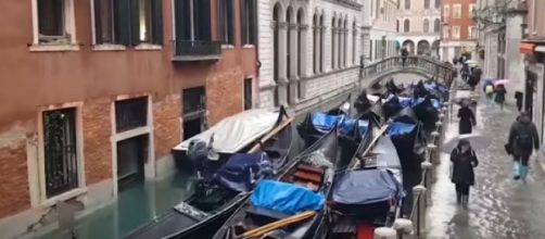 Venice is flooded by the highest tides since 1960s. [Image source/Guardian News YouTube video]