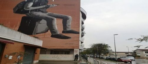 Murales "Ritornerai?". Lo scatto è di Daniele Geniale