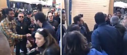 Matteo Salvini durante lo scambio di vedute con l'uomo che finisce per insultarlo.