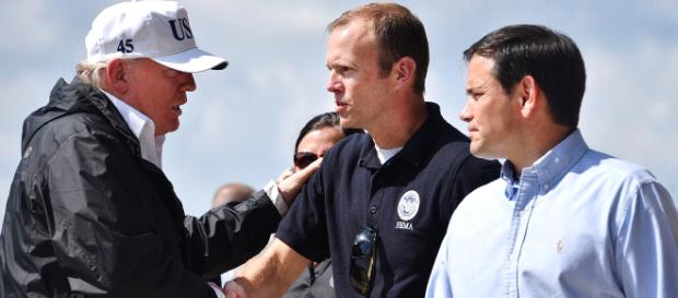President Donald Trump, left, greets Brock Long, center, and Sen. Marco Rubio in Fort Meyers, Fla. - Image credit -U.S. Department of Defense President Donald Trump, left, greets Brock Long, center, and Sen. Marco Rubio in Fort Meyers, Fla. - Image credit -U.S. Department of Defense