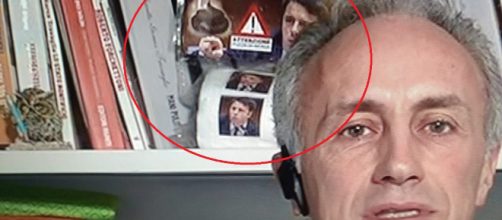 Il fotogramma incriminato del collegamento tv di Travaglio per cui Renzi ha annunciato querela.