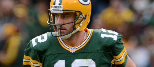 Green Bay Packers quarterback Aaron Rodgers finally gets a defender. [Image via Mike Morbeck/Wikimedia Commons]