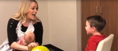 Carrie Underwood surprises her son, Isaiah, with a 4th birthday song he will always remember. [Image source: Kristina Lena-YouTube]