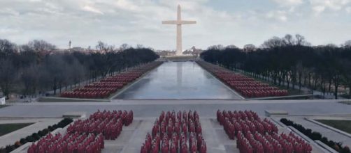 Handmaids gather together to protest in Washington, DC. [Image Hulu/YouTube]