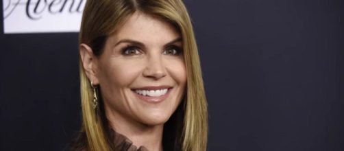 Actress Lori Loughlin fired from Hallmark channel's parent company over college cheating scandal. [Image Source: WKYC Channel 3 - YouTube]