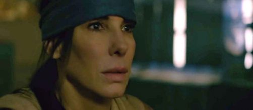 A sequel to the novel "Bird Box" will focus on Sandra Bullock's character, Malorie. [Image Netflix/YouTube]