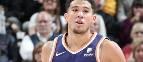 Devin Booker nearly had 60 points in a Suns' loss on Monday (Mar. 25). [Image via NBA/YouTube]