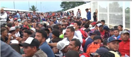 Thousands of migrant caravans try to enter US-Mexico border. - [Today News / YouTube screencap]