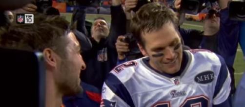 Tebow and Brady chat after the Patriots beat the Broncos in the 2011 AFC Divisional Game. [Image Credit: NFL Films/YouTube]