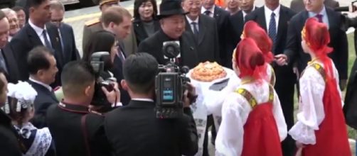 Kim Jong Un greeted with bread and flowers as he arrives in Russia for Putin meeting. [Image source/euronews (in English) YouTube video]