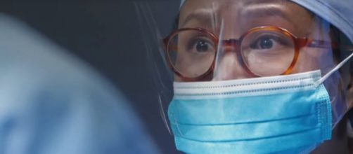 Hawaii Five-O medical examiner, Noelani (Kimee Balmilero) performs a surgery for survival. [Image source: televisionpromosdb-YouTube]