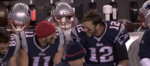 Tom Brady and Julian Edelman keep their chemistry going in the offseason. - [NFL / YouTube screencap]