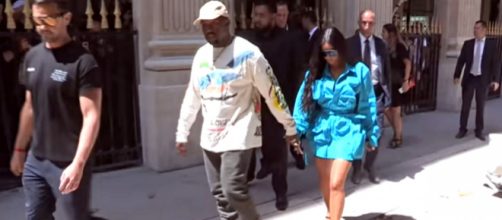 Surrogate mother births Kim Kardashian's and Kanye West's new baby boy. - [Image source: HollywoodLife/YouTube screencap]