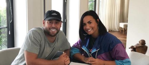 Demi Lovato e Scooter Braun. (Reprodução/Instagram/@ddlovato)