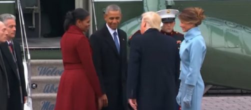 Barack and Michelle Obama leave the US Capitol after Trump's inauguration. [Image source/Business Insider YouTube video]