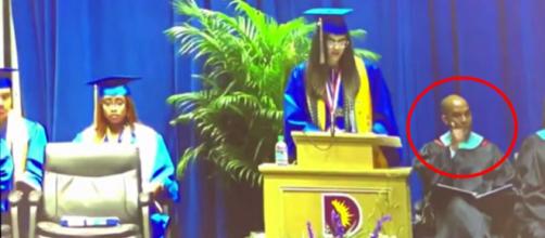 Valedictorian speech cut shorty after high school principal seemingly gives signal. - [Image source: The Young Turks/YouTube screencap]