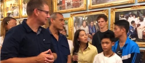 Thai soccer team reunites with some divers who helped save them from the cave. [Image source/Global News YouTube video]