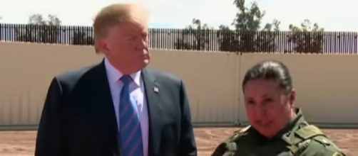 Trump visits the US-Mexico border wall in Calexico, California. [Image source/Fox Business YouTube video]