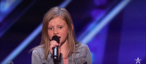 'America's Got Talent' contender Ansley Burns gets the surprise of her life with a saving vote. [Image source: Talent Recap/YouTube]