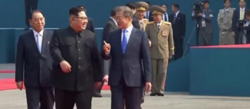 Historic Moment: Kim Jong Un and Moon Jae-in walking on the red carpet. [Image source/CGTN YouTube video]