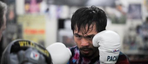 Manny Pacquiao will continue to pursue legacy-enhancing fights over the next year. [Image Source: Dan Johanson/Flickr]