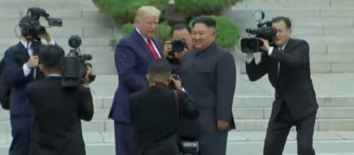 Kim Jong-un welcomes Donald Trump to North Korea. [Image source/Guardian News YouTube video]
