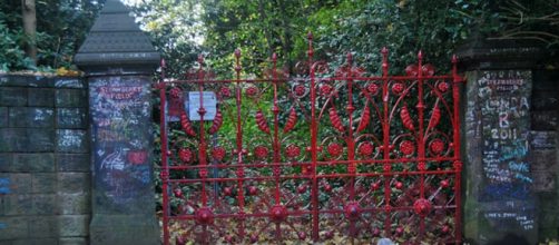 The famous red gates at Strawberry Field open to the public (Image Credit: Loco Steve/Flickr)