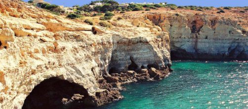 The Algarve coastline is made up of rocky crags, caves and cliffs [Image by Vitor Oliveira/Flickr]