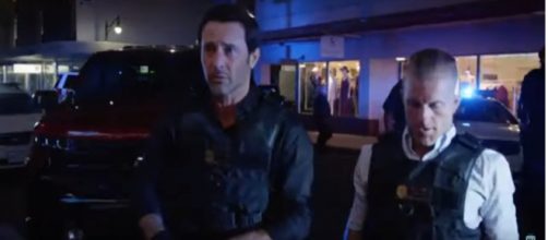 Steve (Alex O'Loughlin) isn't alone with an evening interrupted on the 'Hawaii Five-O' Season 10 premiere. [Image source: TVSpoilers/YouTube]