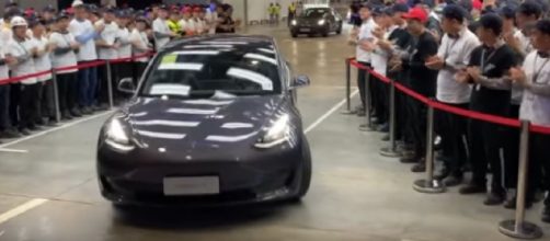 First Tesla made in China rolls out. [Image source/SciNews YouTube video]