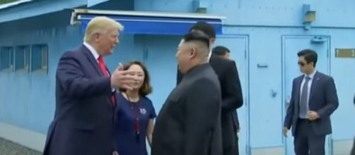 Trump and Kim Jong-un meet at Korean demilitarised zone to pursue denuclearization. [Image source/BBC News YouTube video]