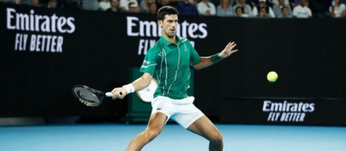 Novak Djokovic in azione contro Raonic (ph. Twitter Australian Open).