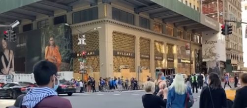 Crowds gather at Trump Tower to celebrate Joe Biden victory. [Image source/Bloomberg Quick Take: Now YouTube video]