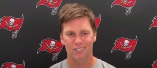 Brady has another playful exchange with James (©Tampa Bay Buccaneers/YouTube)