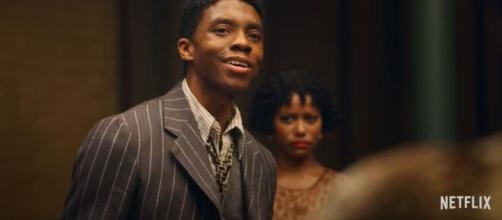 Boseman, who died after a four year battle with Colon Cancer, gives an award worthy performance. [YoutubeScreenshot/Netflix