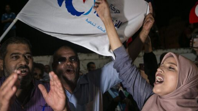 Exit polls show Islamist-inspired party leading Tunisia election ... - timesofisrael.com