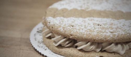 Daquoise can serve as layers for a cake-like construction or even as a nice variation to pavlova. [Image Source: American Almond Videos/YouTube]