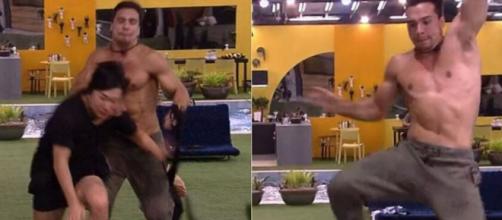 Petrix coloca a mão em Pyong durante corrida, e hipnólogo cai em disputa para atender o Big Fone, do 'BBB20'. (Reprodução/TV Globo)