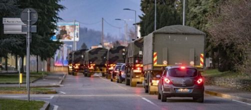 Bergamo, 70 mezzi dell'esercito scortano 60 bare fuori dalla regione per la cremazione - Credit: Repubblica.it