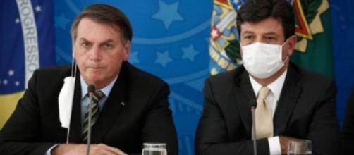 Presidente Jair Bolsonaro e o ministro da Saúde, Luiz Henrique Mandetta. (Reprodução/Globo).