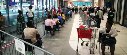 Shopping queues during Lockdown, Hillcrest South Africa. [Photo by Hendrik du Preez]