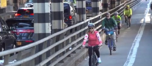 Using a bike for transport the best way to avoid the COVID-19 and lockdown. [Image source/Streetfilms YouTube video]