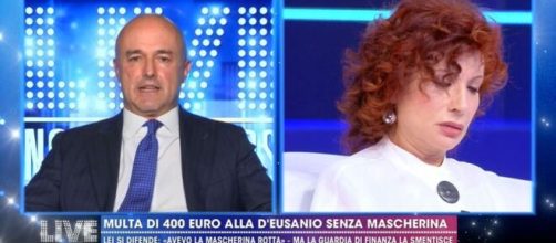 Nuzzi contro D'Eusanio: a Live Non è la D'Urso scontro sul caso della multa di 400 euro alla giornalista che non avrebbe indossato la mascherina.