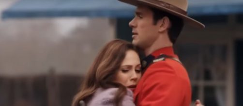 Elizabeth rushes, relieved, to embrace Nathan on 'When Calls the Heart' but does the response speak to her future? [Image Source: ET/YouTube]