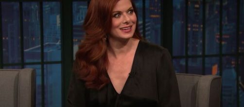 Debra Messing tells the story of what happened when she stole a prop from NBC. [Image Source: LateNightWithSethMeyers/YouTube]